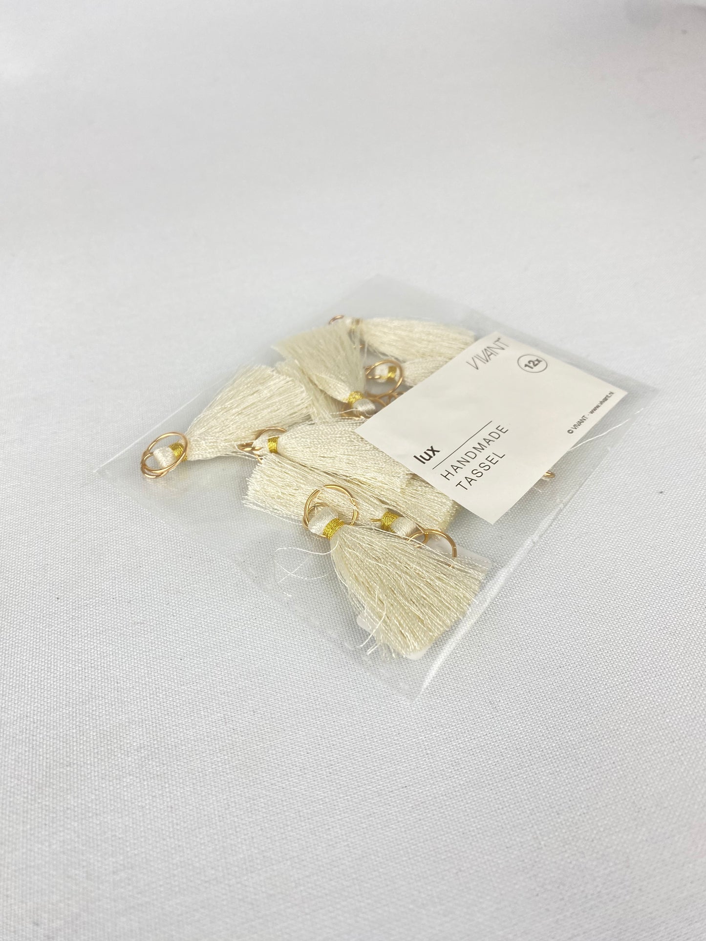 Tassel lux cremevit handgjord 12st/fp